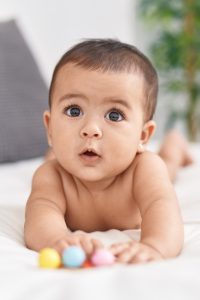 baby playing with toy